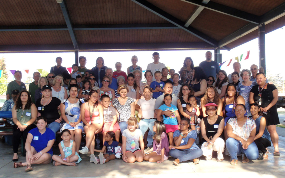 Volunteers at Friends Foster Children San Gabriel Valley with young kids